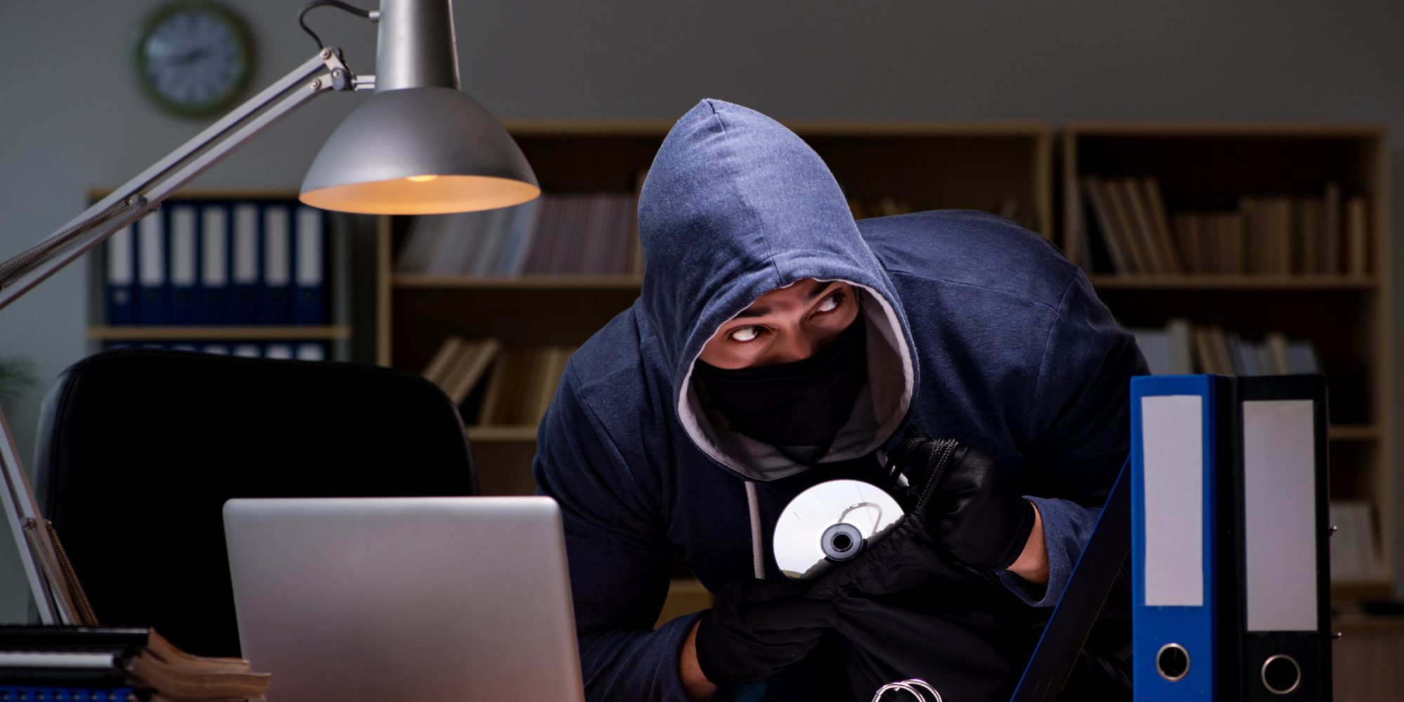 hacker-stealing-personal-data-from-home-computer