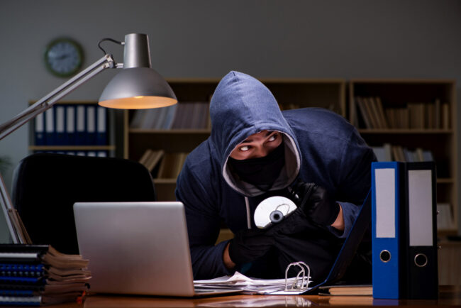 hacker-stealing-personal-data-from-home-computer