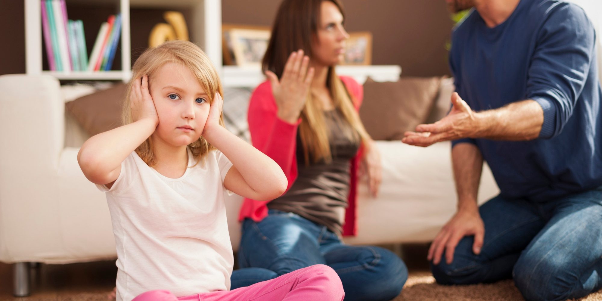 little-girl-doesn-t-want-hear-arguing-parents