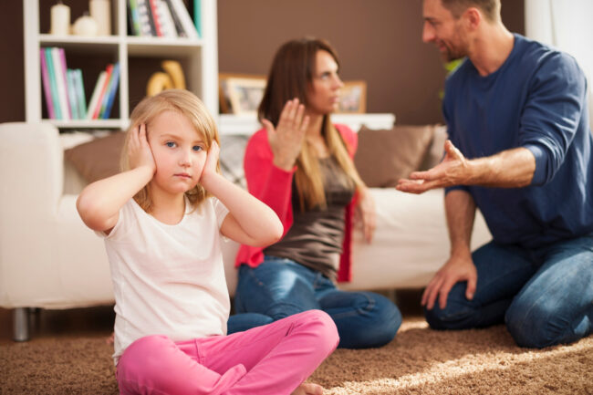 little-girl-doesn-t-want-hear-arguing-parents